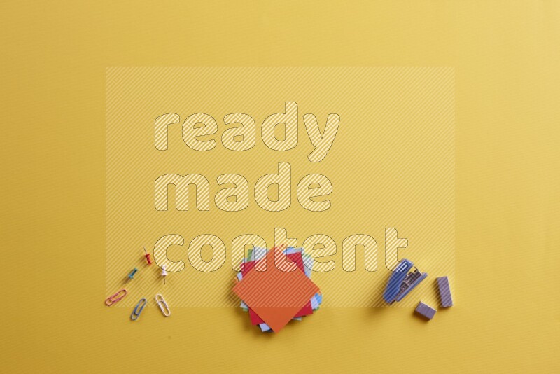 Multicolored sticky notes with school supplies on yellow background