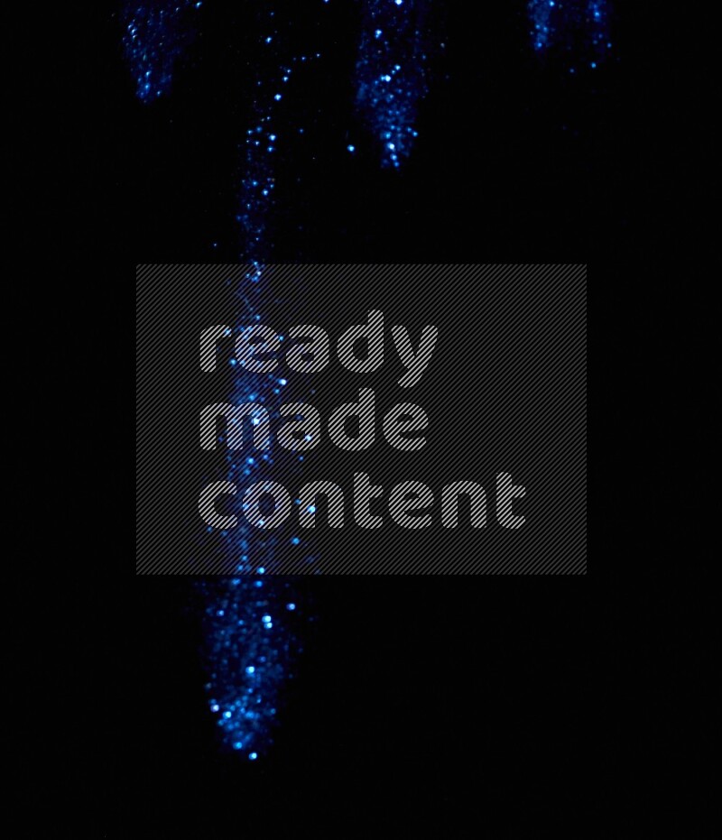 Blue glitter powder isolated on black background