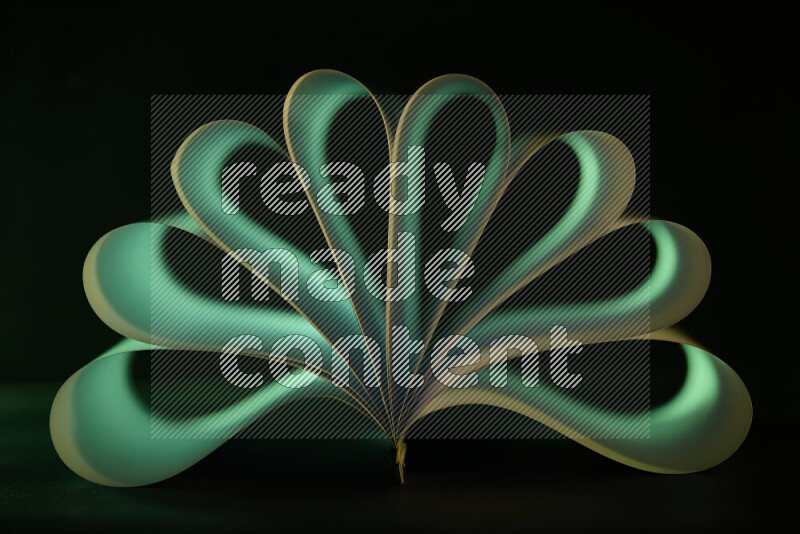 An abstract art piece displaying smooth curves in green gradients created by colored light
