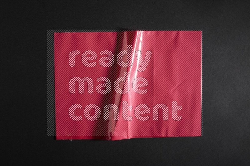 Colored plastic textures on black background