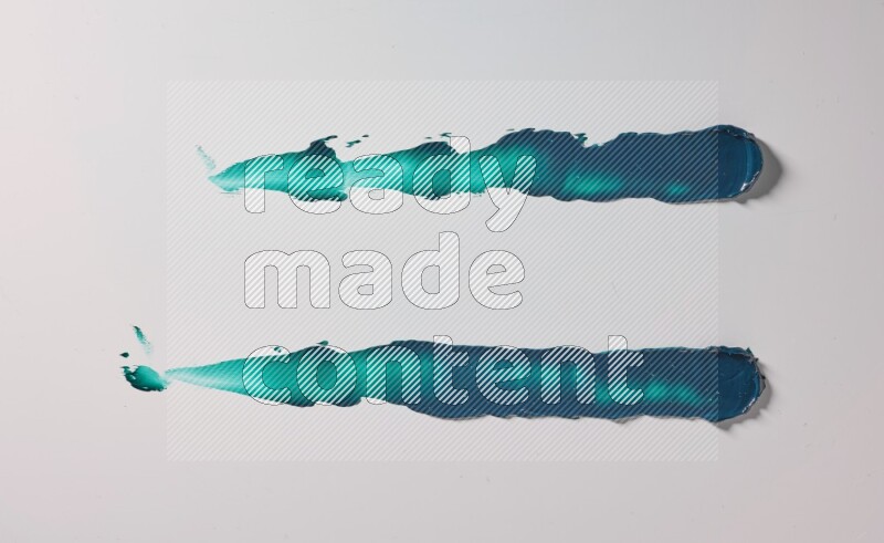 Turquoise painting knife strokes on white background