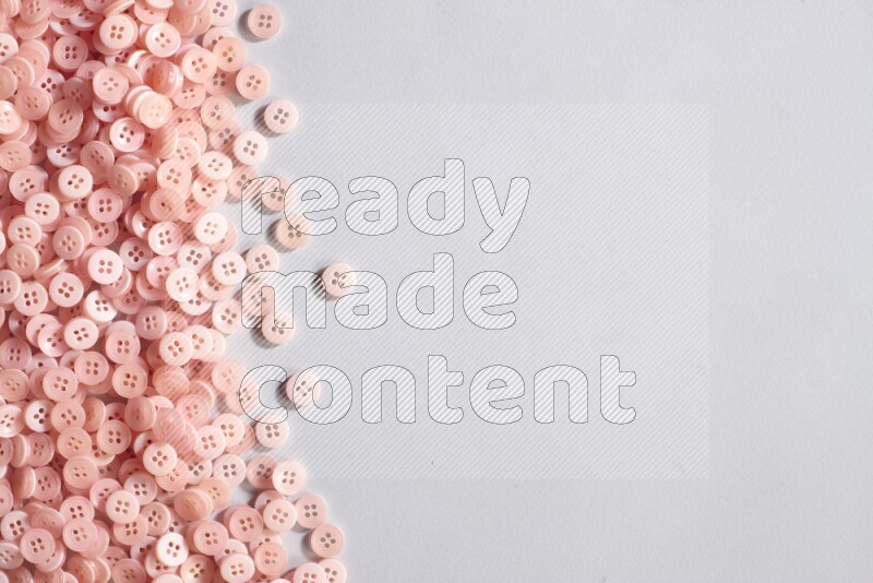 أزرار زهرية موضوعة علي خلفية رمادية