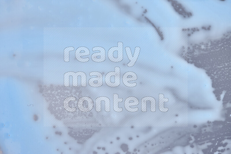 Close-ups of abstract blue paint texture in different shapes