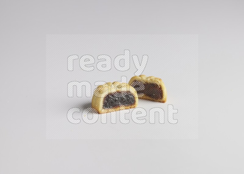 Half Maamoul filled with date direct on white background