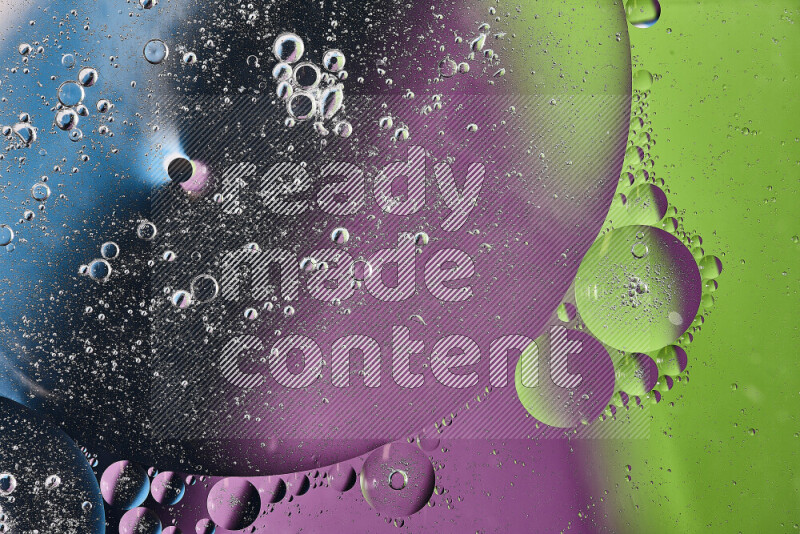 Close-ups of abstract oil bubbles on water surface in shades of purple, green and blue