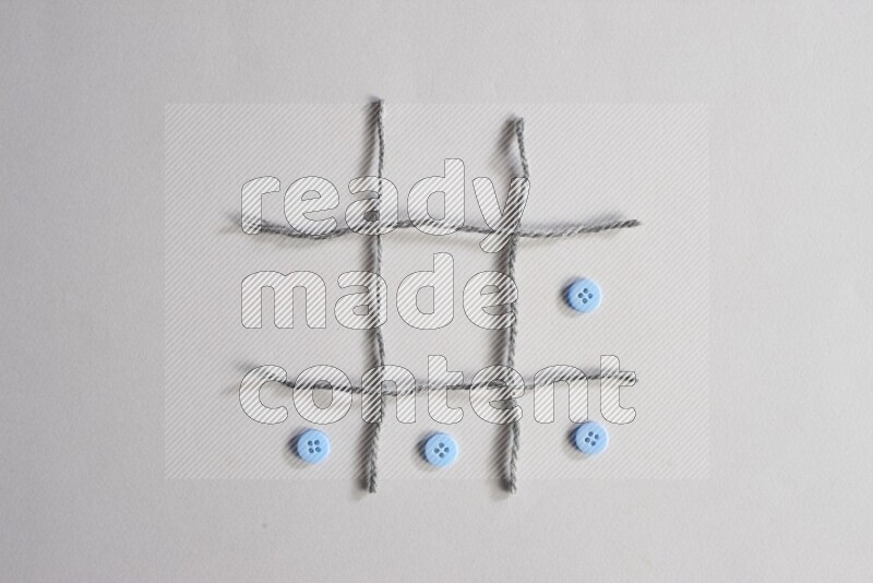 Blue buttons placed on grey background