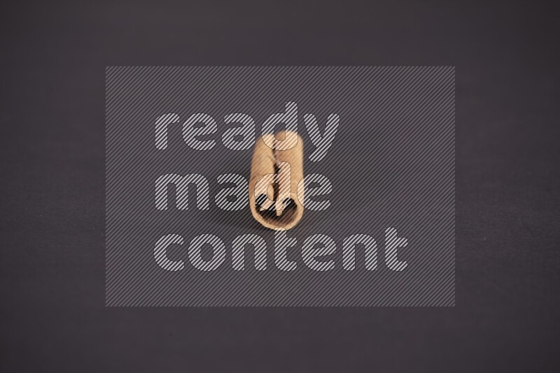 Cinnamon stick on black background