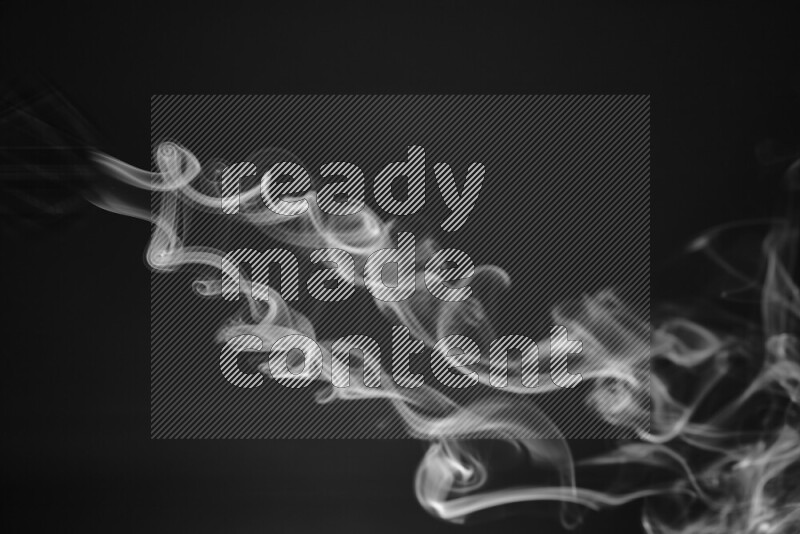 Motion of wavy smoke isolated on dark background