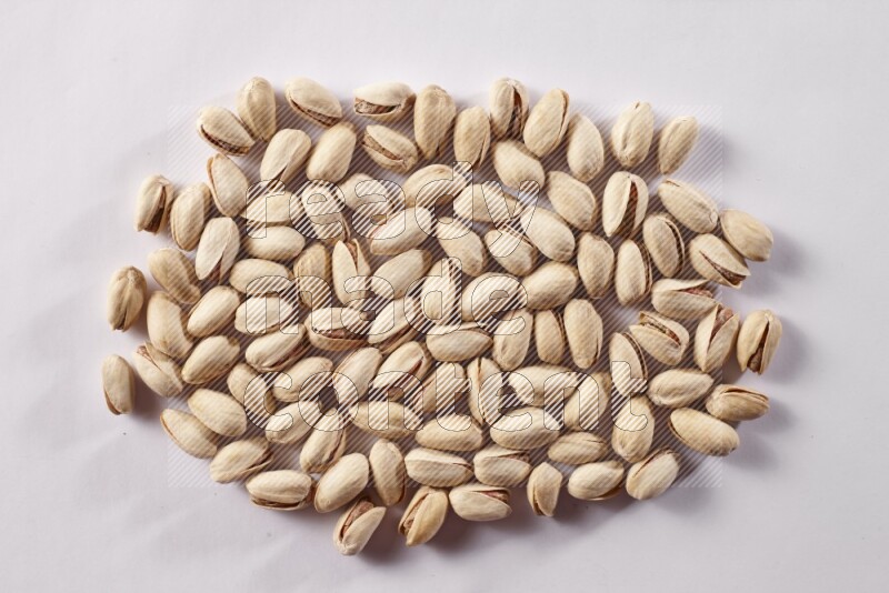Pistachios on white background