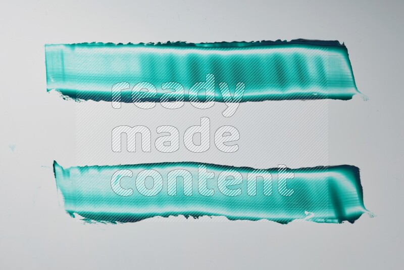 Turquoise painting knife strokes on white background