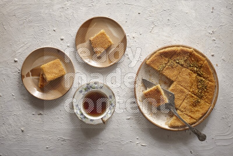 Konafa with tea in a light setup