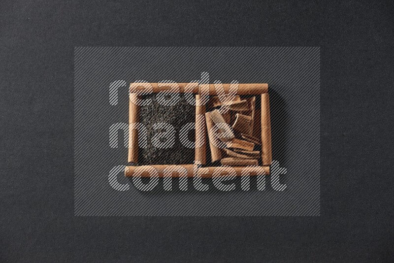 2 squares of cinnamon sticks full of tea and cinnamon on black flooring