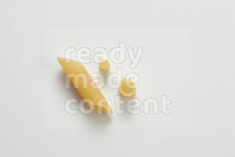 Different pasta types on white background