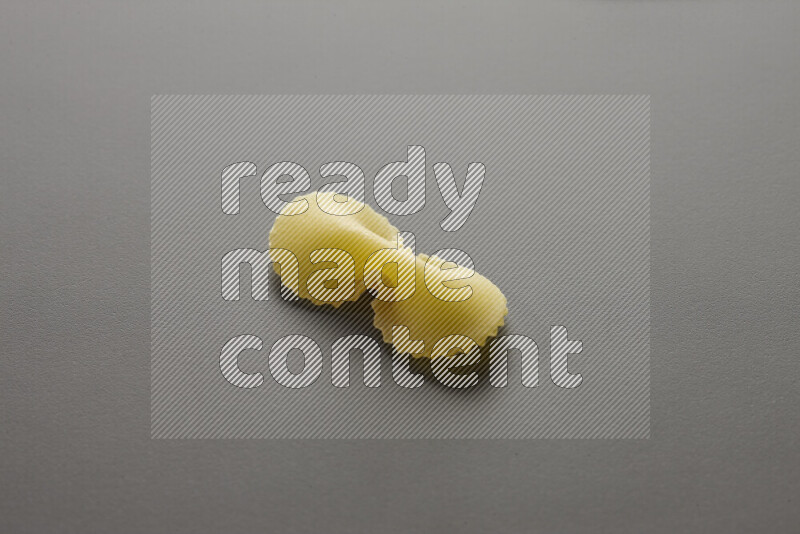 Fiocchi pasta on grey background