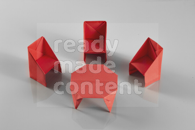 Origami dinning room on grey background
