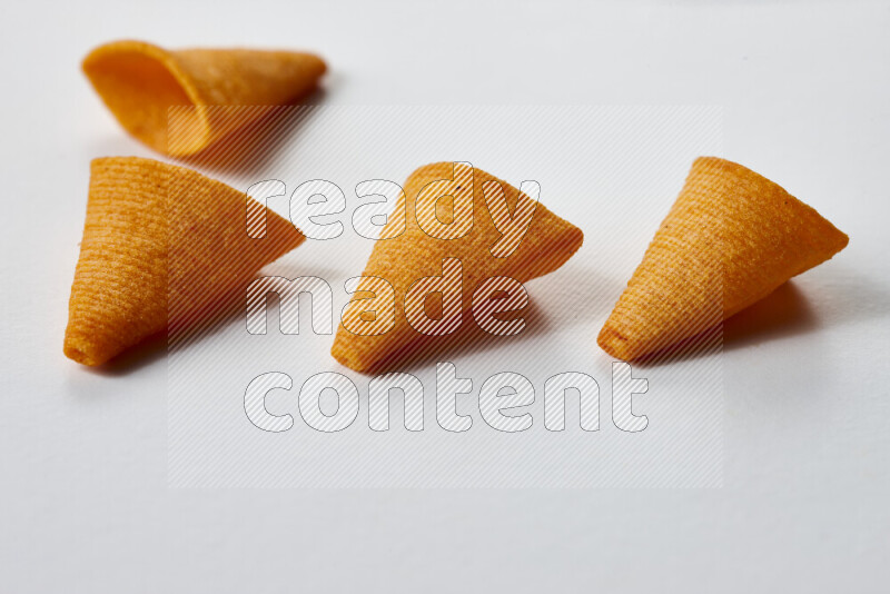 Assorted snacks on white background