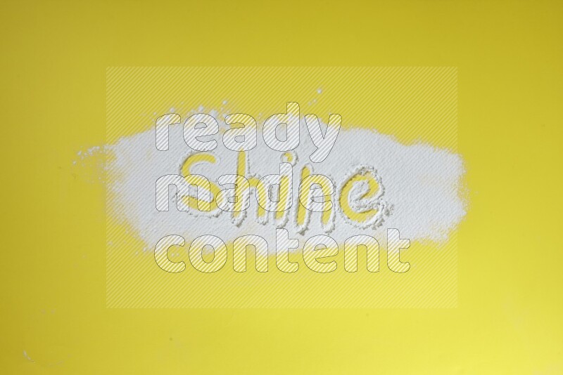 A word written with powder on yellow background