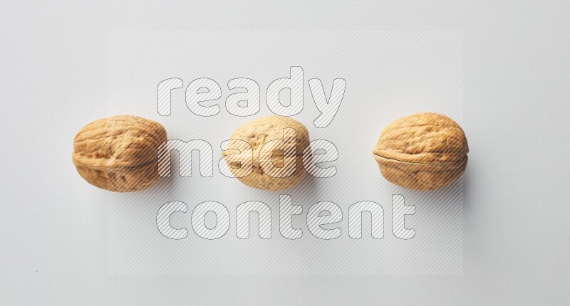Top-view shot of walnut on white background