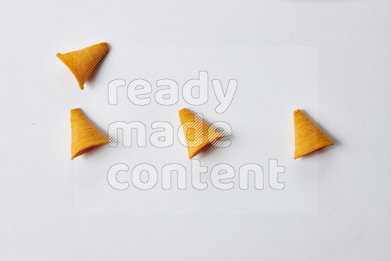 Assorted snacks on white background