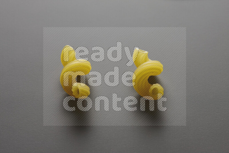 Twist pasta on grey background
