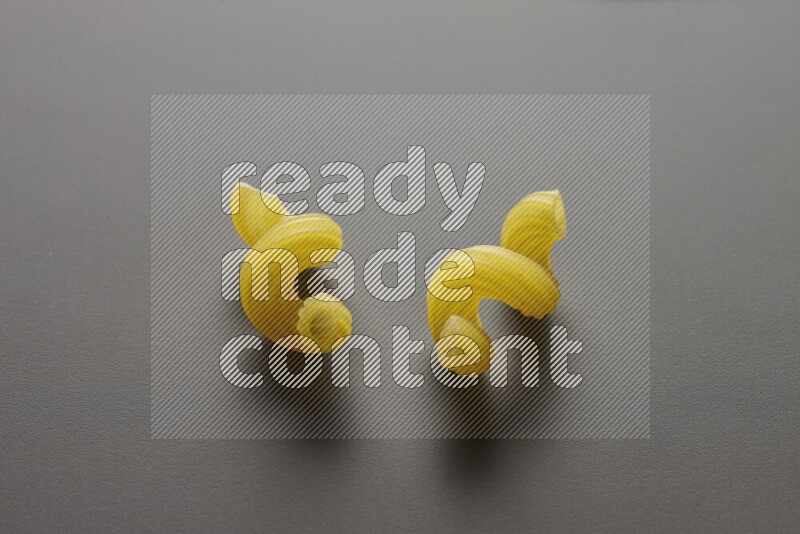Twist pasta on grey background