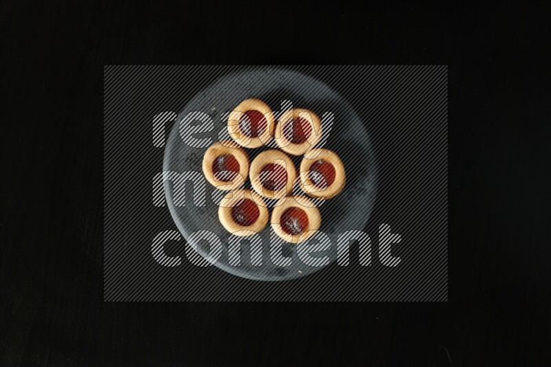 Jam cookies on a black background