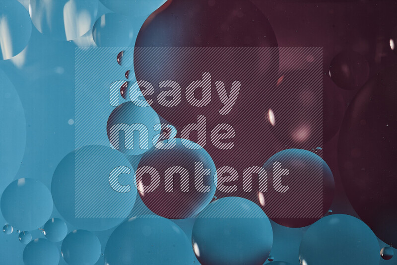 Close-ups of abstract oil bubbles on water surface in shades of blue and purple