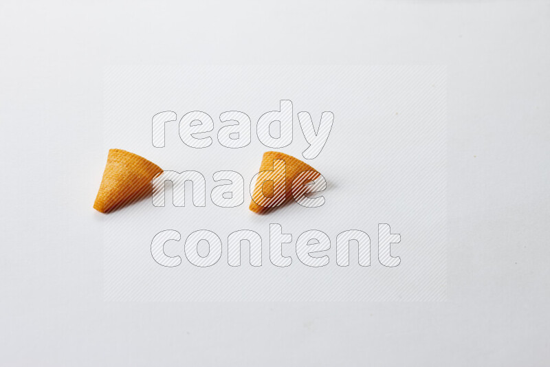 Assorted snacks on white background