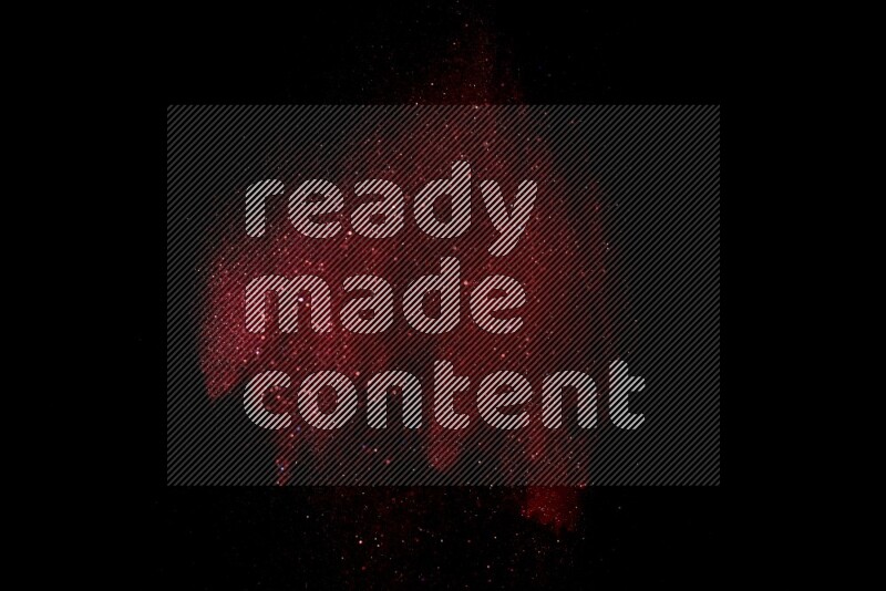 Red glitter powder isolated on black background