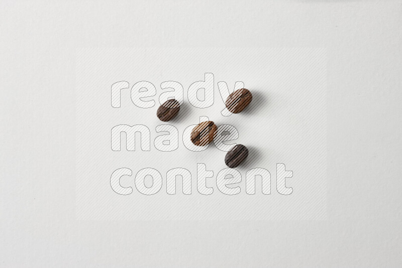 Roasted coffee beans on white background