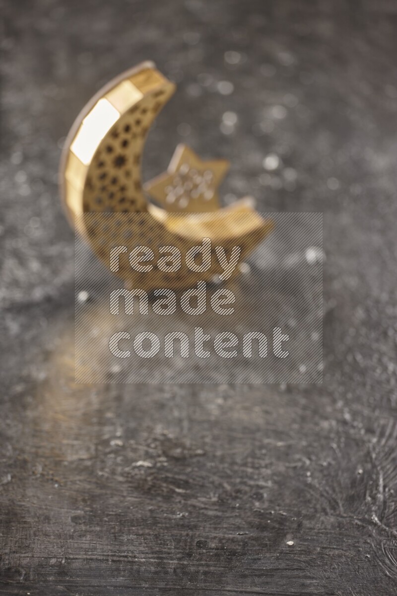 An out of focus lantern on textured black background