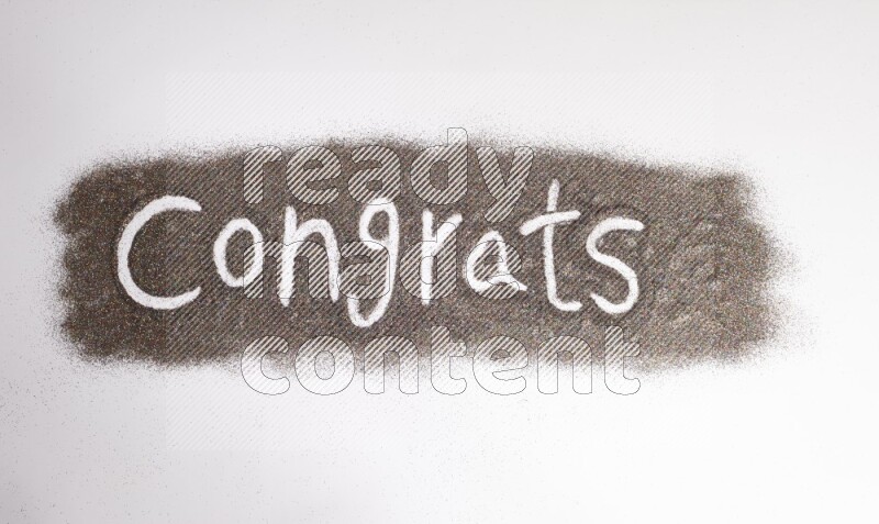 A word written with glitter on white background