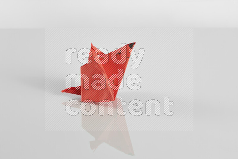 Origami animals on grey background