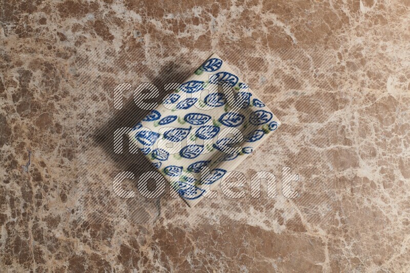 A decorative pottery plate on beige marble background