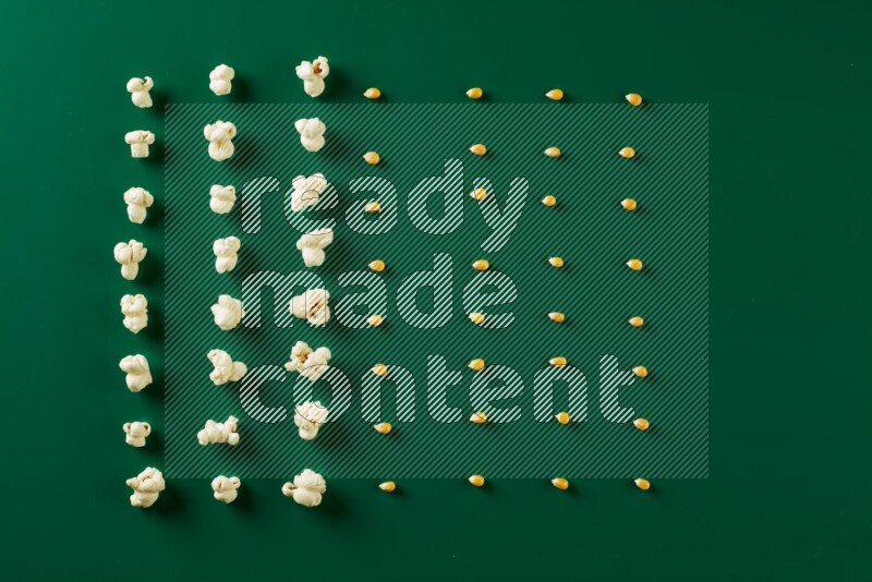 Popcorn flakes and seeds on a green background in a top view shot