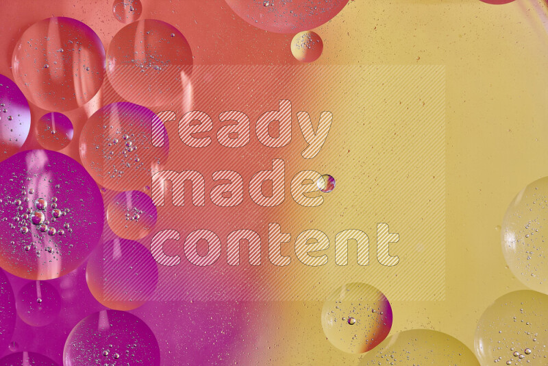 Close-ups of abstract oil bubbles on water surface in shades of yellow, orange and pink
