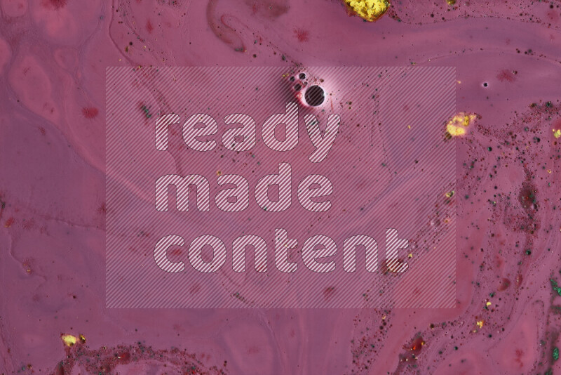 لقطة مقربة لأنماط دوامية باللون الأحمر مع جزئيات ملونة