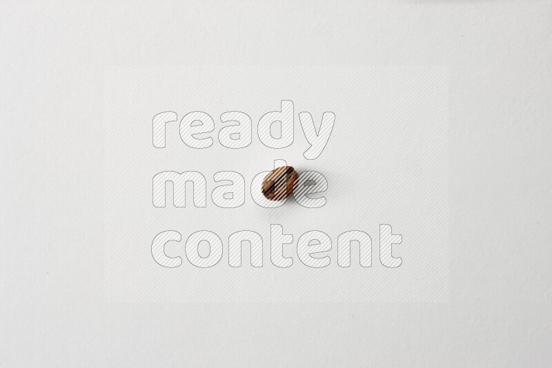 Roasted coffee beans on white background