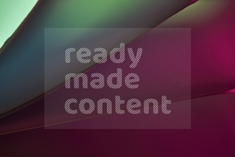 فن تجريدي يعرض منحنيات مع تدرجات الألوان الدافئة والباردة مكونه بضوء ملون