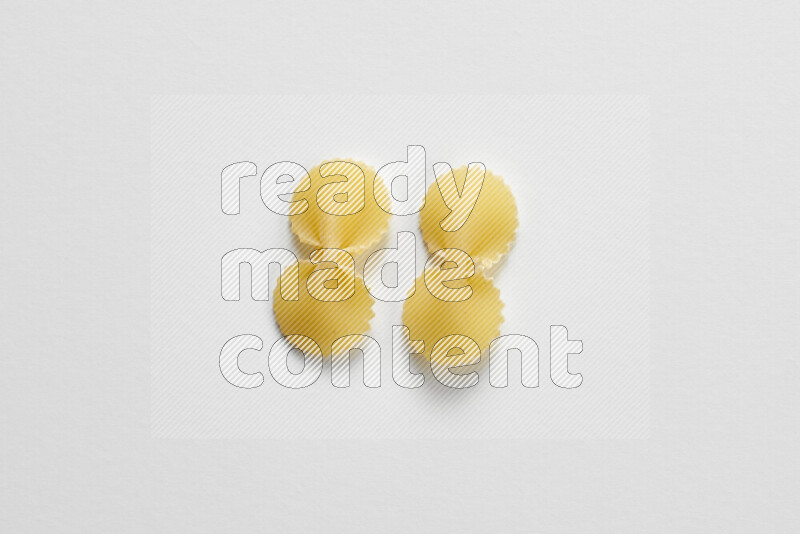 Fiocchi pasta on white background