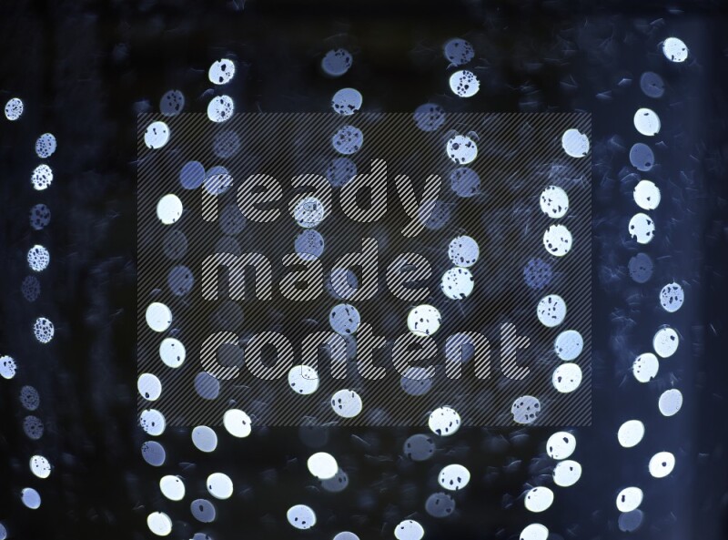 Bokeh light in white with water drops