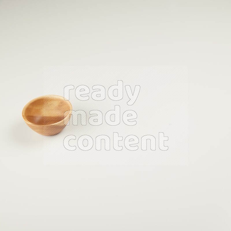 Wooden bowl on white background