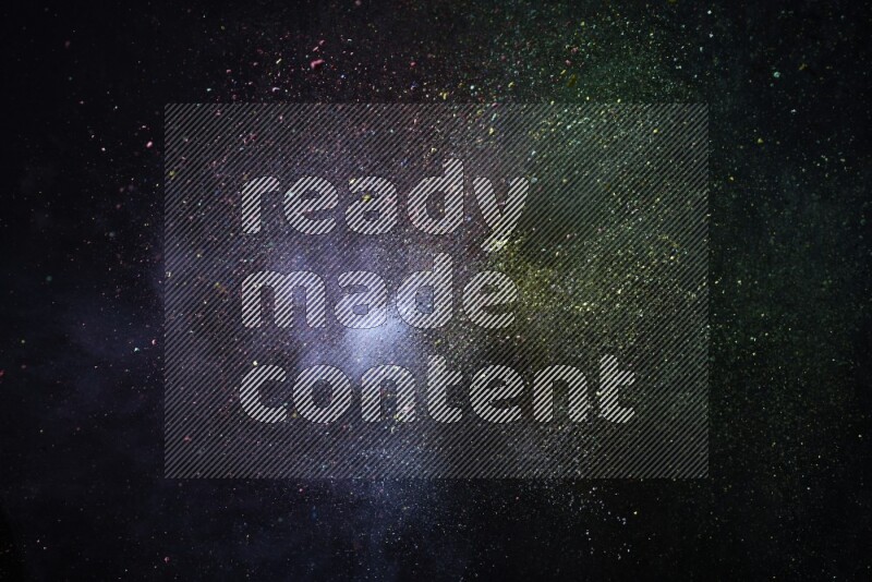 Colorful powder explosion on black background