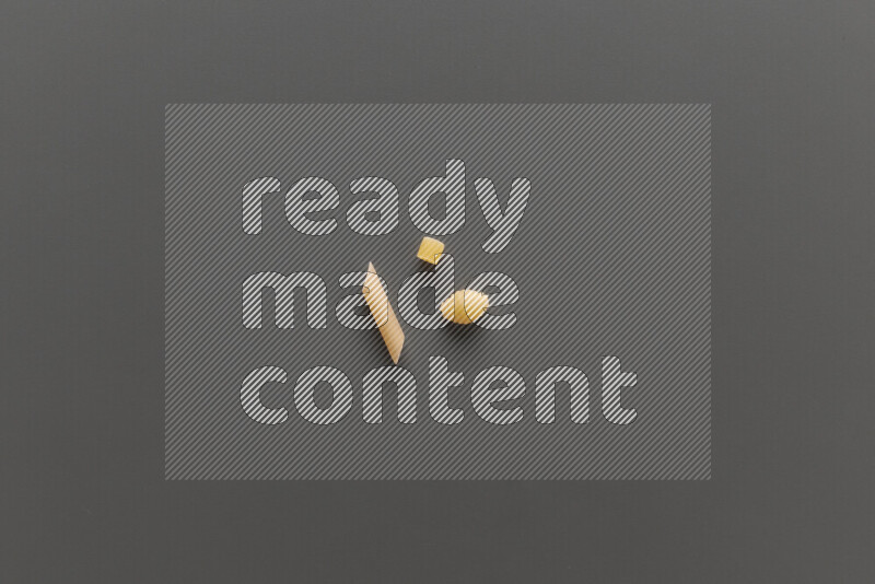 Different pasta types on grey background