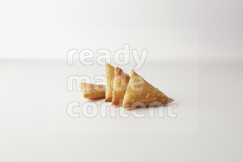 sambosas on a white background