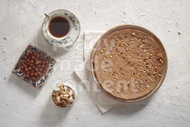 Basbousa with nuts in a light setup