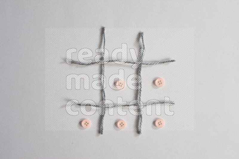 أزرار زهرية موضوعة علي خلفية رمادية