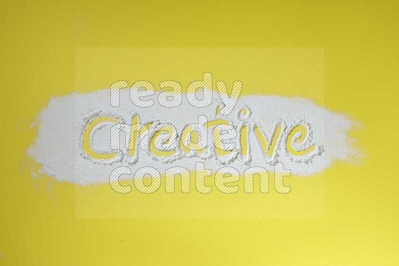 A word written with powder on yellow background