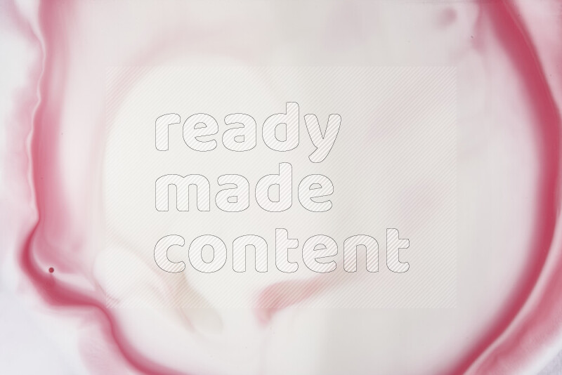 A close-up of abstract swirling patterns in red and white