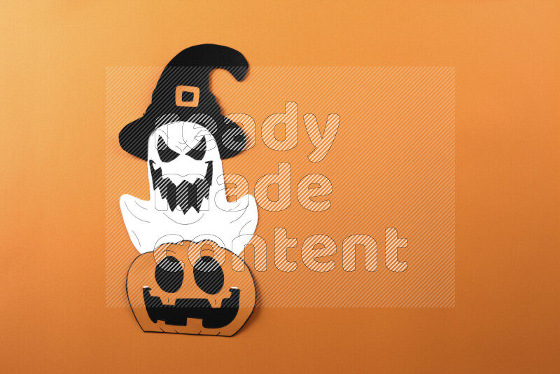Halloween hand crafts on orange background